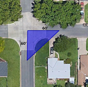 An aerial view of a neighborhood??Description automatically generated